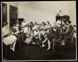 Group of young blind women playing ukeleles at the New York Association for the Blind, 111 East 59th Street, New York, 1926